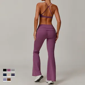 Purple high-waisted yoga set with cross back bra and flare pants from a back view perspective