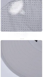 Detail shot of breathable mesh eyelets and reinforced stitching on a wide-brim sun hat