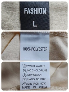 Detail view of clothing tag showing size L, 100% polyester fabric, and washing instructions