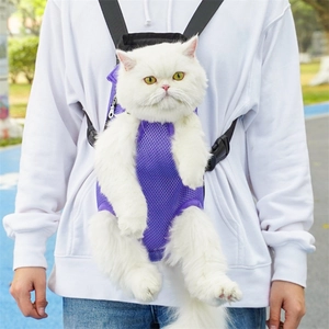 Outdoor model showing a purple mesh pet backpack with a white cat for mid-sized pets
