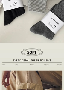 Detailed view of ribbed cotton crew socks in neutral tones with soft knit texture