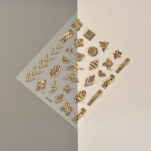 Leopard print nail stickers with gold foil geometric shapes and heart patterns Co-238
