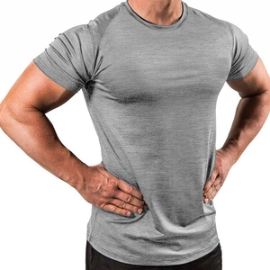 Close-up of grey quick-dry sports t-shirt showing breathable fabric texture and slim fit