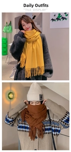 Detail of soft winter scarves with tassels in bright yellow and coffee brown knits