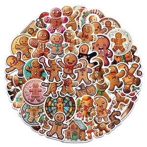 Detailed view of assorted Christmas gingerbread man stickers and festive gingerbread houses