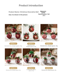 Detail of burlap Christmas balls with pine needles, red berries and plaid patterns