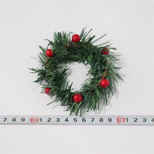 Detailed top view of 10cm Christmas candle ring with pine needles and six red berries