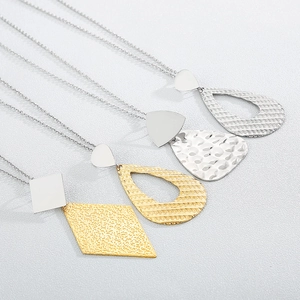Minimalist geometric titanium steel pendant necklaces in gold and silver hammer finish