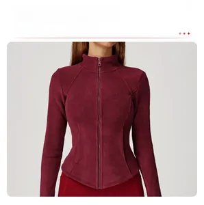Detail of burgundy fleece jacket showing contoured princess seams and stand collar design