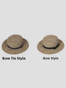 Detail view of woven straw boater hats showing the knot and bowknot ribbon styles