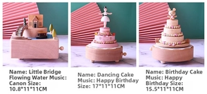 Detailed views of handmade wooden music boxes with moving mechanical scenes and gift packaging