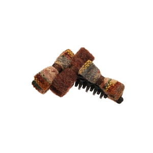 Flocculated tweed bow hair claw clip in warm orange and brown tones for women