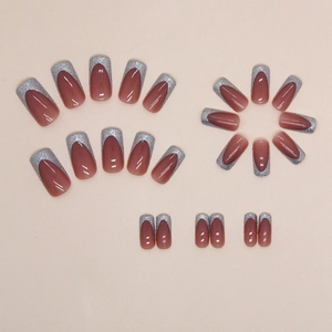 Elegant medium long square french fake nails with nude base and silver glitter tips