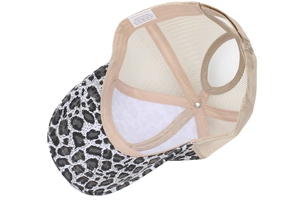 Detail of high ponytail baseball cap showing mesh interior and crossed elastic bands