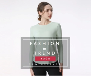Detail view of mint green long sleeve yoga shirt with breathable athletic fabric texture
