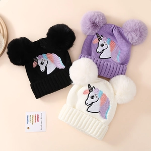 Winter knitted hats for girls with unicorn embroidery and fluffy double pom-poms