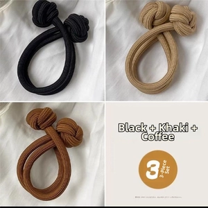 Three-piece set of thick elastic hair ties in black, khaki, and brown with double-knot design