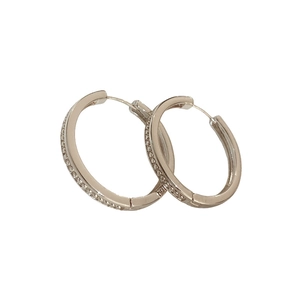 Sleek geometric silver hoop earrings with shimmering pave-set cubic zirconia stones