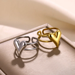 3D heart open rings set in gold and silver finish with double band design on jewelry box