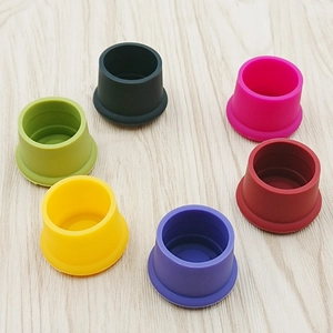 Detailed view of colorful food-grade silicone bottle caps in six vibrant shades