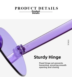 Detail of sturdy metal hinge on purple translucent heart-shaped rimless sunglasses