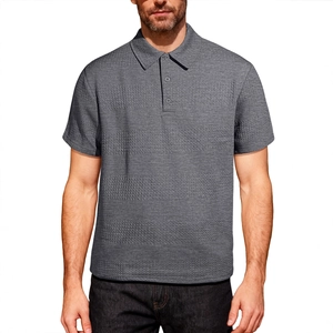 Polo homme gris foncé en maille gaufrée, coupe ajustée avec col boutonné classique