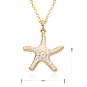Detail view of gold starfish pendant with white micro-inlays and dimension markings