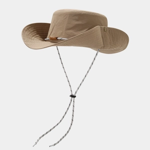 Detail of khaki outdoor sun hat featuring waterproof fabric and adjustable chin strap