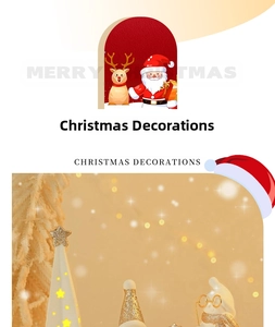 Detail of ceramic Christmas snowman with gold glitter hat and glowing LED spire light