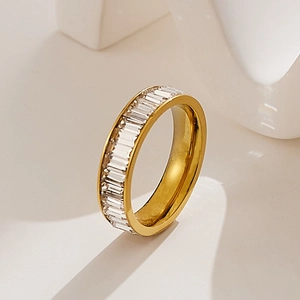 Detailed view of square-cut cubic zirconia stones on a gold-plated stainless steel ring