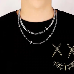 Double-layered silver titanium steel necklace featuring star pendants and Cuban chain link