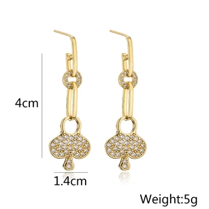 Detail view of 18K gold plated spade drop earrings showing dimensions 4x1.4cm and weight 5g