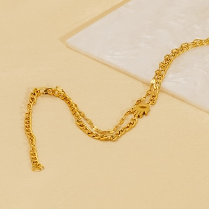 Double-layer 18K gold plated stainless steel Hamsa Hand bracelet on white stone tray