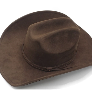 Detailed view of dark brown suede cowboy hat with decorative band and metallic buckle