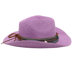 Detail of purple woven cowboy hat with ethnic pattern band and silver metal pendants