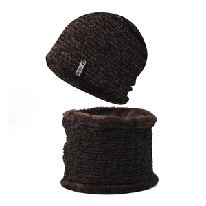 Macro shot of dark brown chenille knit hat and neck warmer set with thick plush lining