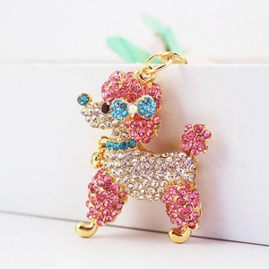 Sparkling pink crystal poodle keychain with gold plating and rhinestone accents