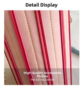 Close-up of pink and magenta leather stripes with yellow contrast stitching on small bag