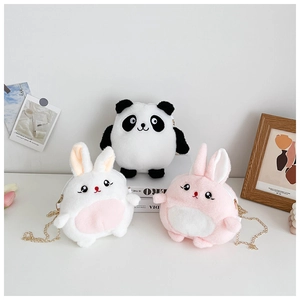 Detail view of plush panda and bunny coin purses with elegant golden metal chains