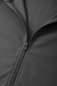 Macro shot of smooth charcoal gray zipper closure on yoga top with fine jersey texture