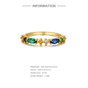 Detail of S925 sterling silver ring with colorful AAAA zirconia stones in gold finish