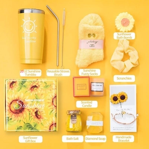 Yellow sunflower gift box set featuring 20oz tumbler, scented candle, and spa accessories