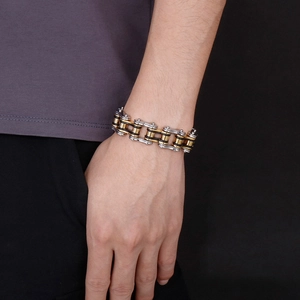 Industrial two-tone gold and silver chain bracelet for men with polished finish