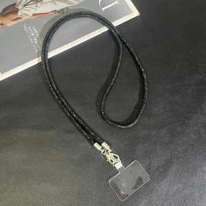 Luxurious black rhinestone crossbody phone strap with silver metal clasp and clear connector