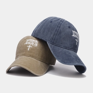 Vintage washed cotton baseball caps with cross print and religious text in khaki and blue
