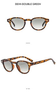 Detail of vintage round tortoiseshell sunglasses with green gradient lenses and rivets