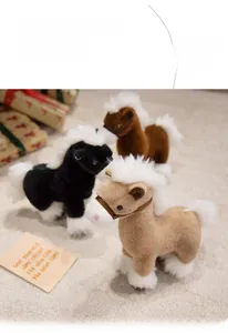 Detailed view of plush horse toys in brown and black with white manes and tail accents