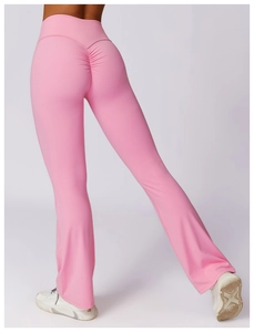 Macro view of high-waist yoga flare pants showing V-shaped back seam and scrunch butt detail
