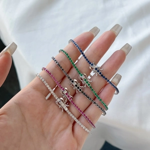 Detail showing five colors of 2mm tennis bracelets with secure clasps and zircon inlay