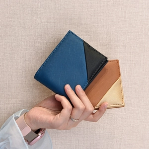 Men's bifold PU leather wallets featuring geometric color-block designs in blue and brown